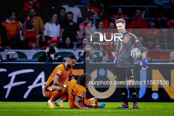 Netherlands defender Nathan Ake gets injured during the match between the Netherlands and Germany at the Johan Cruijff ArenA for the UEFA Na...