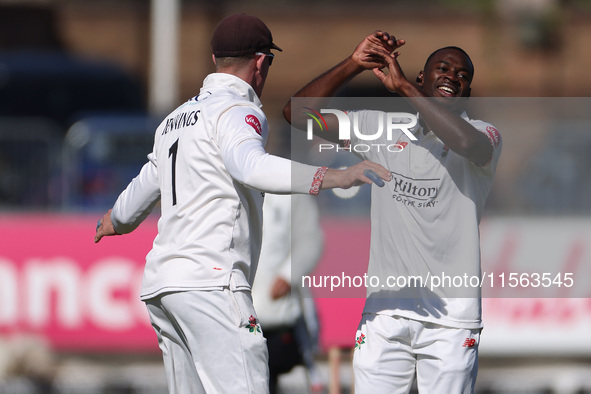 Anderson Phillip of Lancashire celebrates with Keaton Jennings after trapping Alex Lees of Durham LBW during the Vitality County Championshi...