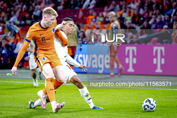 Netherlands midfielder Jerdy Schouten plays during the match between the Netherlands and Germany at the Johan Cruijff ArenA for the UEFA Nat...