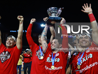 Juan Carlos Gamboa #47 of Diablos Rojos lifts the Zaachila cup after winning the 2024 Mexican Baseball League (LMB) King Series Championship...