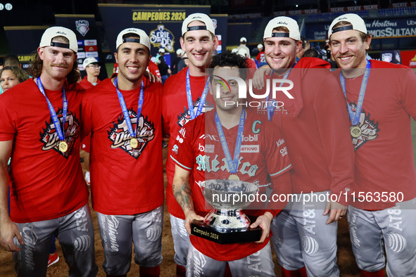 Juan Carlos Gamboa #47 of Diablos Rojos holds the Zaachila cup after winning the 2024 Mexican Baseball League (LMB) King Series Championship...