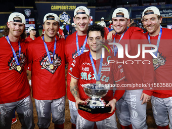 Juan Carlos Gamboa #47 of Diablos Rojos holds the Zaachila cup after winning the 2024 Mexican Baseball League (LMB) King Series Championship...