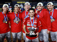 Juan Carlos Gamboa #47 of Diablos Rojos holds the Zaachila cup after winning the 2024 Mexican Baseball League (LMB) King Series Championship...