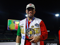 Jose Marmolejos #46 of Diablos Rojos receives the MVP prize after winning the 2024 Mexican Baseball League (LMB) King Series Championship at...