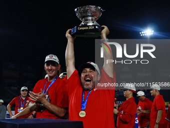 Othon Diaz lifts the Zaachila Cup after winning the 2024 Mexican Baseball League (LMB) King Series Championship at Estadio Mobil Super. Diab...