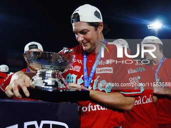 Trevor Bauer #96 of Diablos Rojos lifts the Zaachila Cup after winning the 2024 Mexican Baseball League (LMB) King Series Championship at Es...