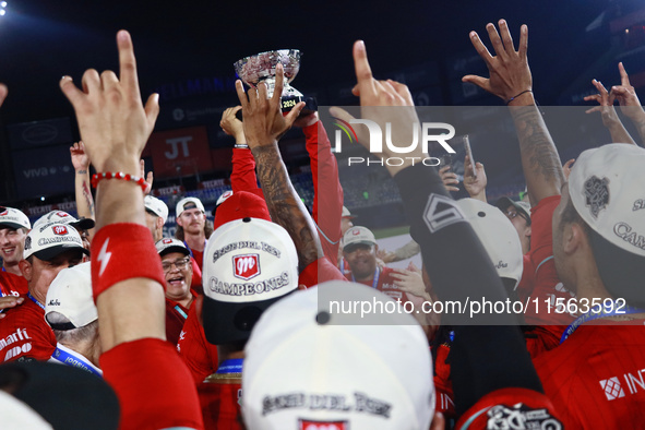 Diablos Rojos teammates celebrate after winning the 2024 Mexican Baseball League (LMB) King Series Championship at Estadio Mobil Super. Diab...