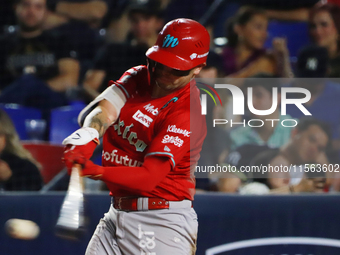 Juan Carlos Gamboa #47 of Diablos Rojos hits the ball during the 2024 Mexican Baseball League (LMB) King Series Championship match between D...