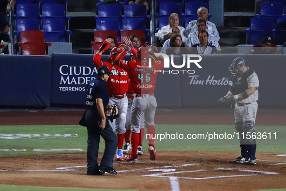 Jose Marmolejos #46 of Diablos Rojos celebrates after hitting a home run during the 2024 Mexican Baseball League (LMB) King Series Champions...