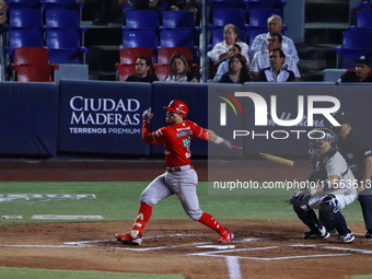 Jose Marmolejos #46 of Diablos Rojos hits the ball during the 2024 Mexican Baseball League (LMB) King Series Championship match between Diab...