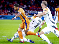 Germany midfielder Robert Andrich and Netherlands midfielder Quinten Timber during the match between the Netherlands and Germany at the Joha...