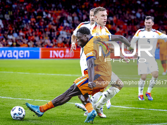 Netherlands forward Brian Brobbey and Germany defender Nico Schlotterbeck during the match between the Netherlands and Germany at the Johan...