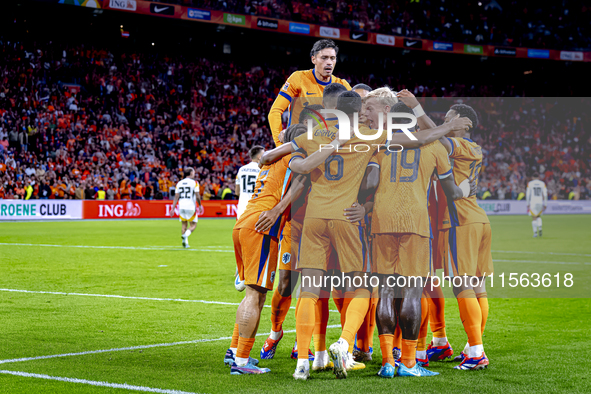 Netherlands forward Brian Brobbey and Netherlands defender Denzel Dumfries celebrate the goal during the match between the Netherlands and G...