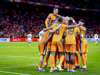 Netherlands forward Brian Brobbey and Netherlands defender Denzel Dumfries celebrate the goal during the match between the Netherlands and G...