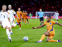 Netherlands midfielder Quinten Timber and Germany defender Waldemar Anton during the match between the Netherlands and Germany at the Johan...