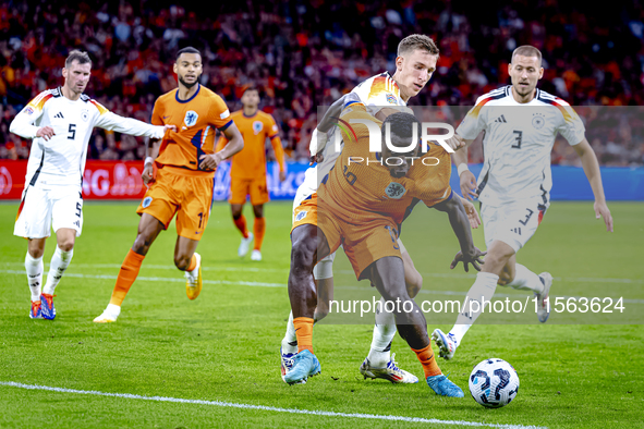 Netherlands forward Brian Brobbey and Germany defender Nico Schlotterbeck during the match between the Netherlands and Germany at the Johan...