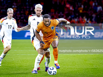 Germany midfielder Robert Andrich and Netherlands midfielder Quinten Timber during the match between the Netherlands and Germany at the Joha...