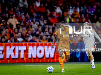 Netherlands midfielder Ryan Gravenberch and Germany midfielder Florian Wirtz during the match between the Netherlands and Germany at the Joh...