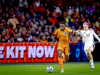 Netherlands midfielder Ryan Gravenberch and Germany midfielder Florian Wirtz during the match between the Netherlands and Germany at the Joh...