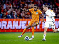 Netherlands midfielder Ryan Gravenberch and Germany midfielder Florian Wirtz during the match between the Netherlands and Germany at the Joh...