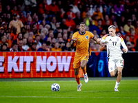 Netherlands midfielder Ryan Gravenberch and Germany midfielder Florian Wirtz during the match between the Netherlands and Germany at the Joh...