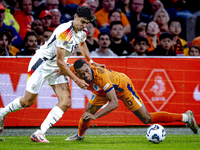 Germany defender Nico Schlotterbeck and Netherlands midfielder Ryan Gravenberch during the match between the Netherlands and Germany at the...