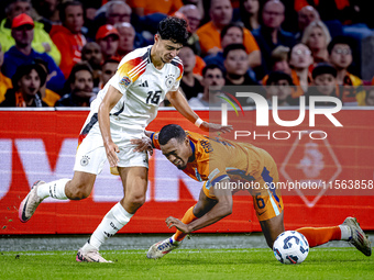 Germany defender Nico Schlotterbeck and Netherlands midfielder Ryan Gravenberch during the match between the Netherlands and Germany at the...