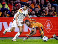 Germany defender Nico Schlotterbeck and Netherlands midfielder Ryan Gravenberch during the match between the Netherlands and Germany at the...