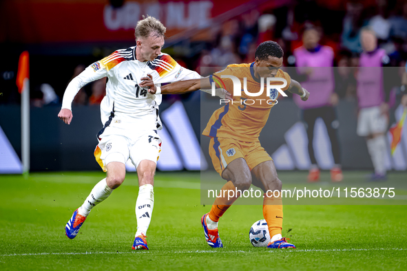 Germany forward Maximillian Beier and Netherlands defender Jurrien Timber during the match between the Netherlands and Germany at the Johan...