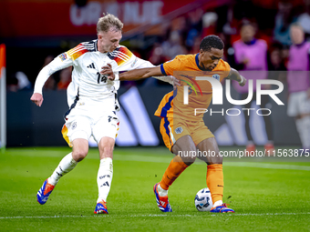 Germany forward Maximillian Beier and Netherlands defender Jurrien Timber during the match between the Netherlands and Germany at the Johan...