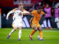 Germany forward Maximillian Beier and Netherlands defender Jurrien Timber during the match between the Netherlands and Germany at the Johan...