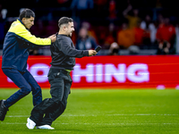 A supporter is on the pitch during the match between the Netherlands and Germany at the Johan Cruijff ArenA for the UEFA Nations League, Lea...