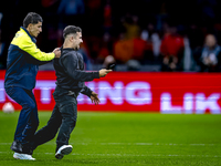 A supporter is on the pitch during the match between the Netherlands and Germany at the Johan Cruijff ArenA for the UEFA Nations League, Lea...