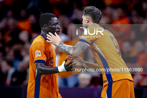 Netherlands forward Wout Weghorst replaces Netherlands forward Brian Brobbey during the match between the Netherlands and Germany at the Joh...