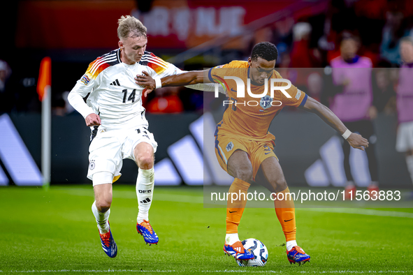 Germany forward Maximillian Beier and Netherlands defender Jurrien Timber during the match between the Netherlands and Germany at the Johan...