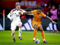 Germany forward Maximillian Beier and Netherlands defender Jurrien Timber during the match between the Netherlands and Germany at the Johan...