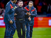 A supporter is on the pitch during the match between the Netherlands and Germany at the Johan Cruijff ArenA for the UEFA Nations League, Lea...