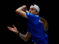 Ugo Humbert of France competes against Alexei Popyrin of Australia during the Davis Cup Group B Stage 2024 match between Australia and Franc...