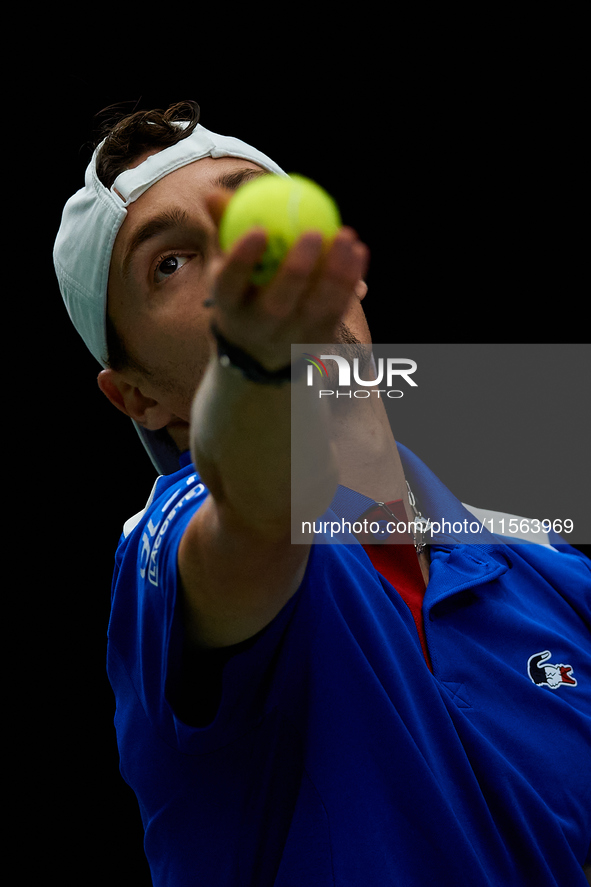 Ugo Humbert of France serves against Alexei Popyrin of Australia during the Davis Cup Group B Stage 2024 match between Australia and France...