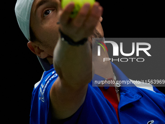 Ugo Humbert of France serves against Alexei Popyrin of Australia during the Davis Cup Group B Stage 2024 match between Australia and France...