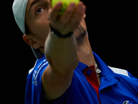 Ugo Humbert of France serves against Alexei Popyrin of Australia during the Davis Cup Group B Stage 2024 match between Australia and France...