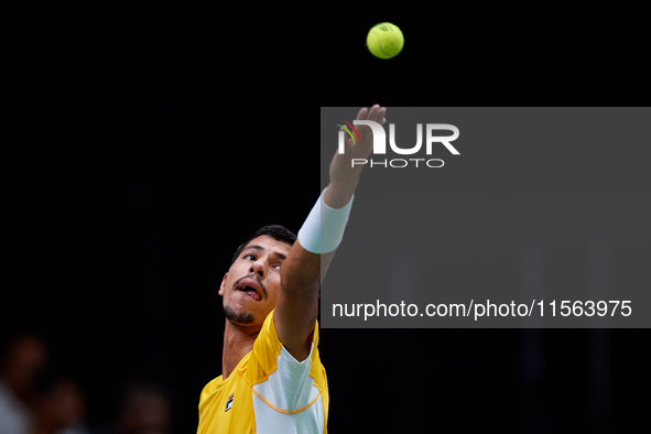 Alexei Popyrin of Australia serves against Ugo Humbert of France during the Davis Cup Group B Stage 2024 match between Australia and France...