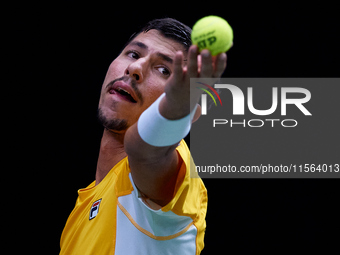 Alexei Popyrin of Australia serves against Ugo Humbert of France during the Davis Cup Group B Stage 2024 match between Australia and France...