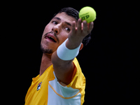 Alexei Popyrin of Australia serves against Ugo Humbert of France during the Davis Cup Group B Stage 2024 match between Australia and France...