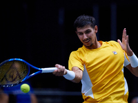 Alexei Popyrin of Australia competes against Ugo Humbert of France during the Davis Cup Group B Stage 2024 match between Australia and Franc...