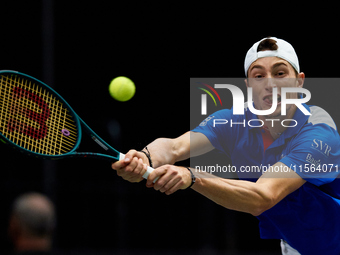 Ugo Humbert of France competes against Alexei Popyrin of Australia during the Davis Cup Group B Stage 2024 match between Australia and Franc...