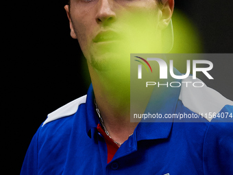 Ugo Humbert of France watches the ball against Alexei Popyrin of Australia during the Davis Cup Group B Stage 2024 match between Australia a...