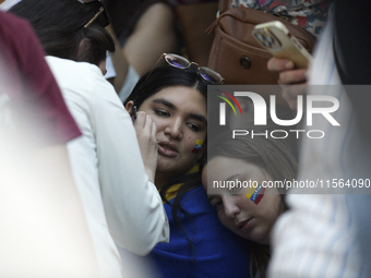 Venezuelans living in Spain take part in a gathering outside the Spanish parliament in support of opposition presidential candidate Edmundo...