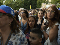 Venezuelans living in Spain take part in a gathering outside the Spanish parliament in support of opposition presidential candidate Edmundo...