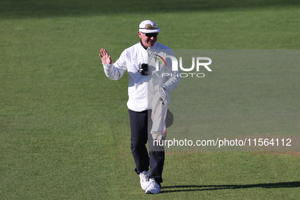 Umpire Graham Lloyd during the Vitality County Championship match between Durham Cricket and Lancashire at the Seat Unique Riverside in Ches...